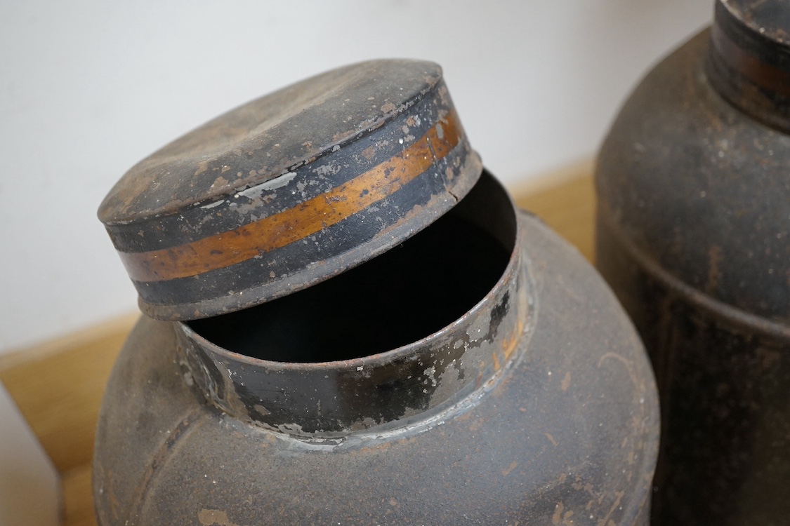 Two painted tin tea caddies, 43cm high. Condition - poor